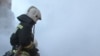 Tajikistan/Russia -- Russian fireman battle with a fire at house near Moscow,while five tajik migrant death, 5 January 2014