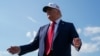 U.S. President Donald Trump boards Air Force One as he departs for Iowa, at Joint Base Andrews