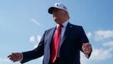 U.S. President Donald Trump boards Air Force One as he departs for Iowa, at Joint Base Andrews